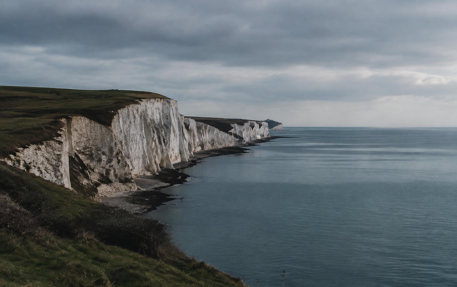 Chalk cliffs along a calm English coastline (illustrative)